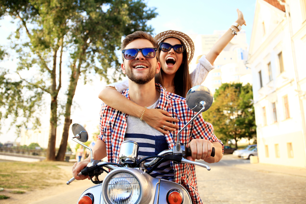 couple on vespa