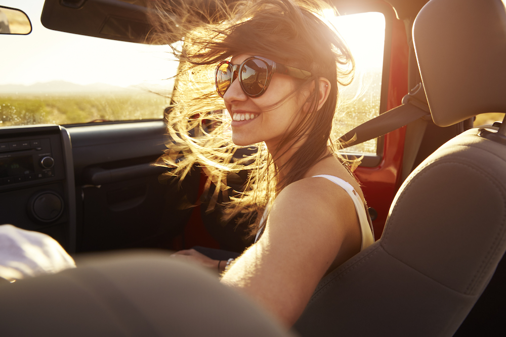 women smiling in jeep